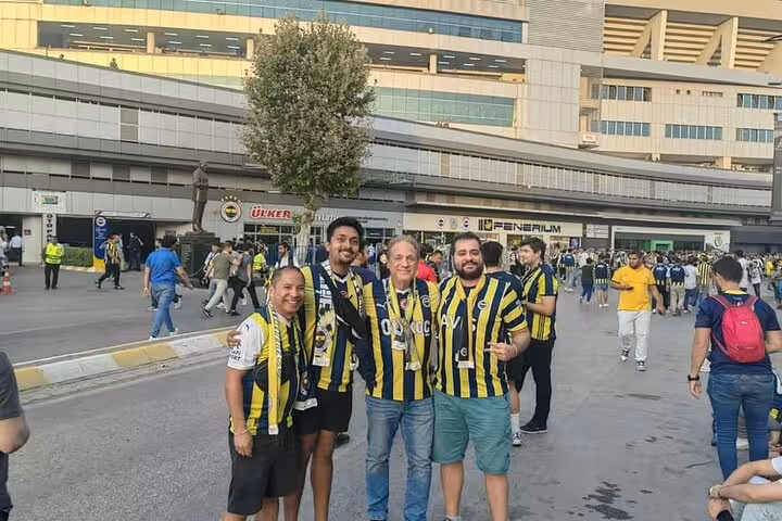 Fans in Fenerbahçe jerseys outside Şükrü Saracoğlu Stadium in Istanbul before joining a local football game