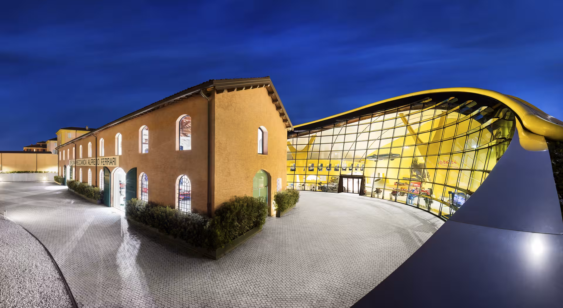 Ferrari Museum Maranello entrance at night, included in combo ticket with Modena museum and Mirabilandia
