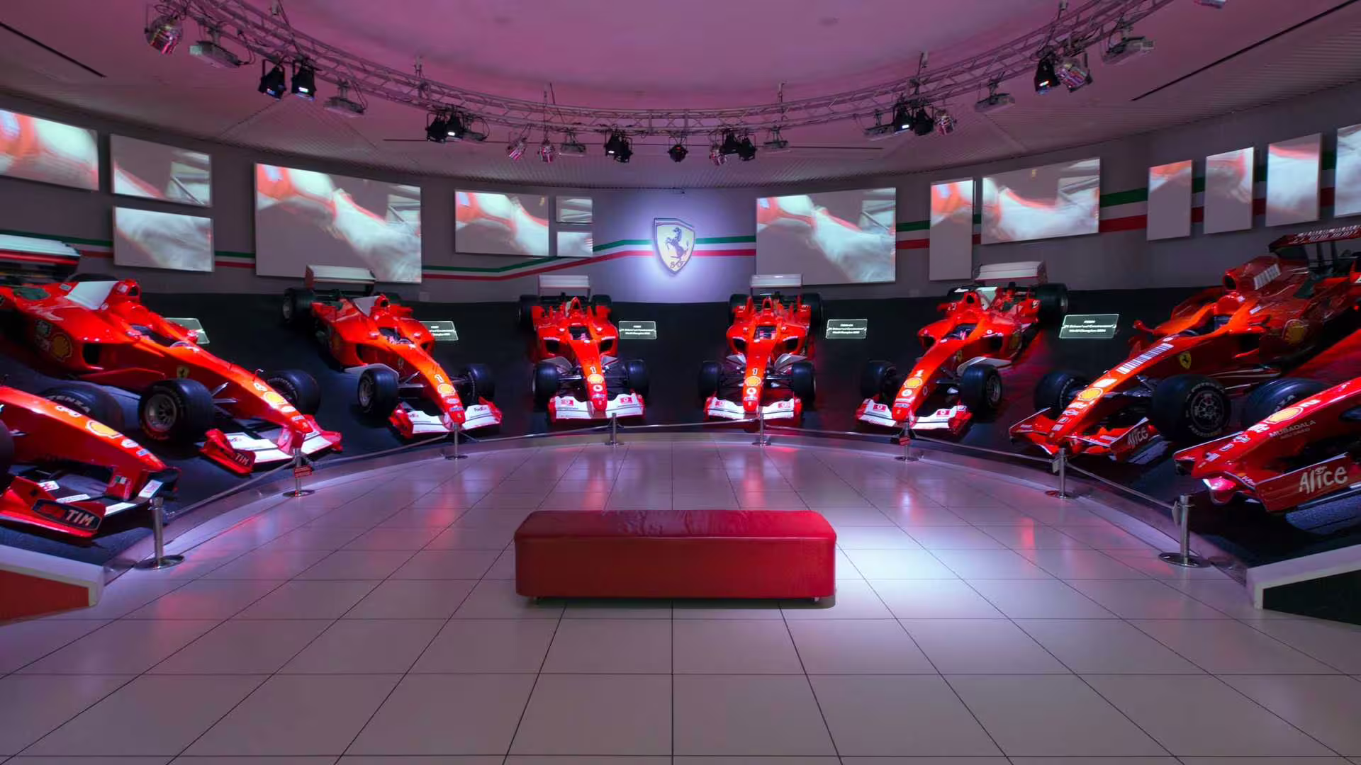 Ferrari Museum Maranello gallery of iconic F1 cars, included with Fiorano track panoramic shuttle tour