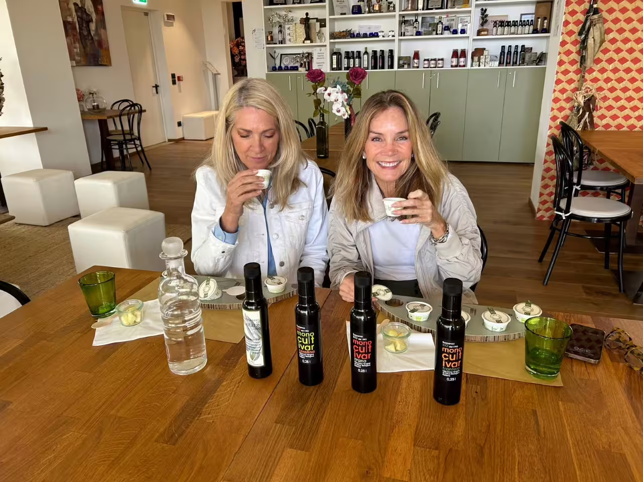 Guests sip and taste Tuscan extra virgin olive oil at Frantoio Buonamici in Fiesole olive oil tour