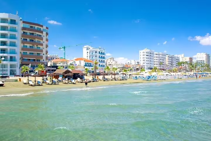 Finikoudes Beach promenade and seafront hotels in Larnaca on a Southern Cyprus sightseeing tour day excursion