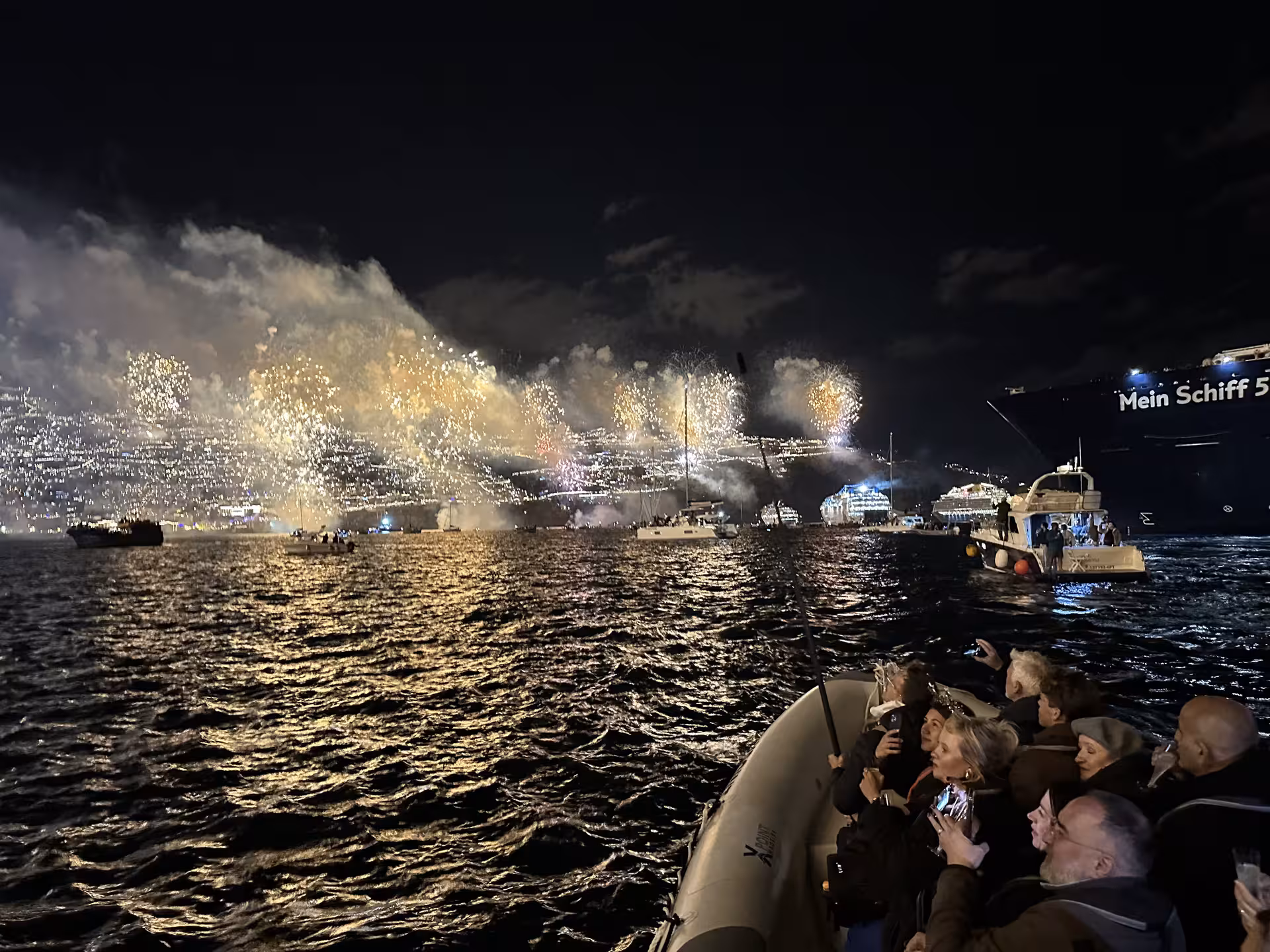 Spectacular fireworks light up the night sky over boats during New Year's Eve at June's Atlantic Festival.