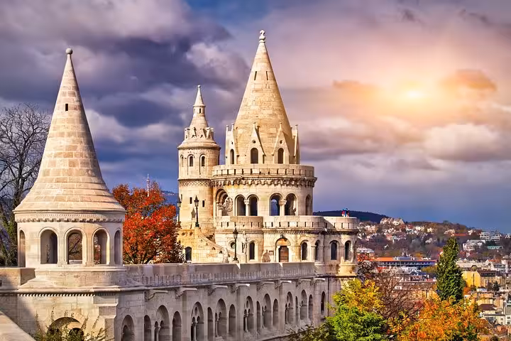 Fisherman’s Bastion in Budapest at sunset, highlight stop on a small-group day trip from Vienna
