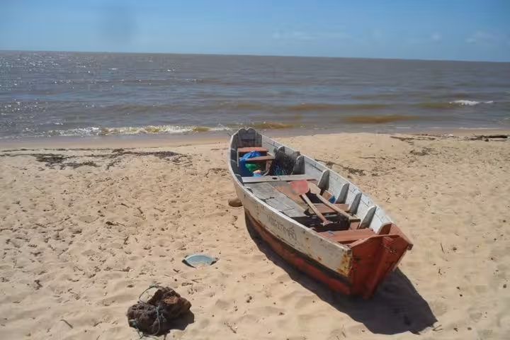 Traditional fishing boat on sandy beach at Marajó Island, Pará, Brazil, on a 2D1N coastal tour