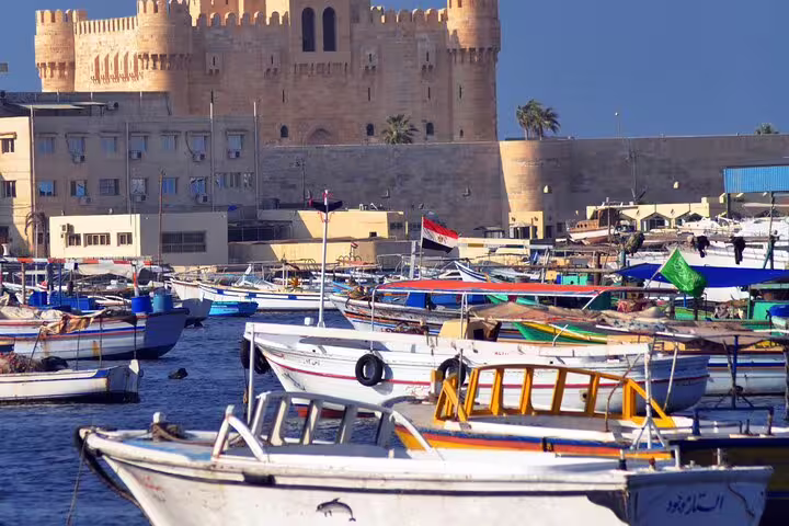 Fishing boats by Qaitbay Citadel in Alexandria, Egypt, on a private Cairo to Alamein day trip