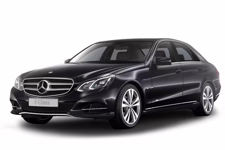Luxurious black Mercedes E-Class sedan for private transfers between Florence and airport.