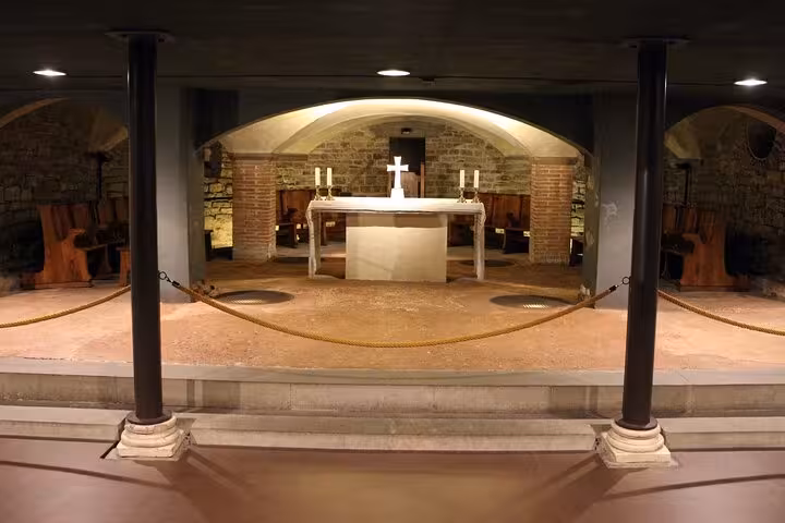 A serene crypt with an altar inside Florence Cathedral, offering a glimpse into historical religious architecture.