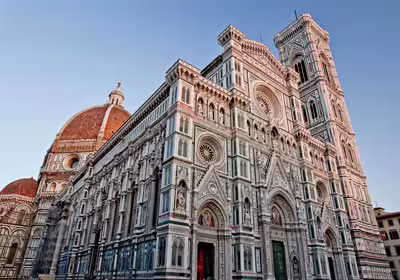 Florence Cathedral Duomo and Giotto’s Bell Tower at sunset, a highlight of the 9-day self-drive Divine Country food and wine tour in Tuscany