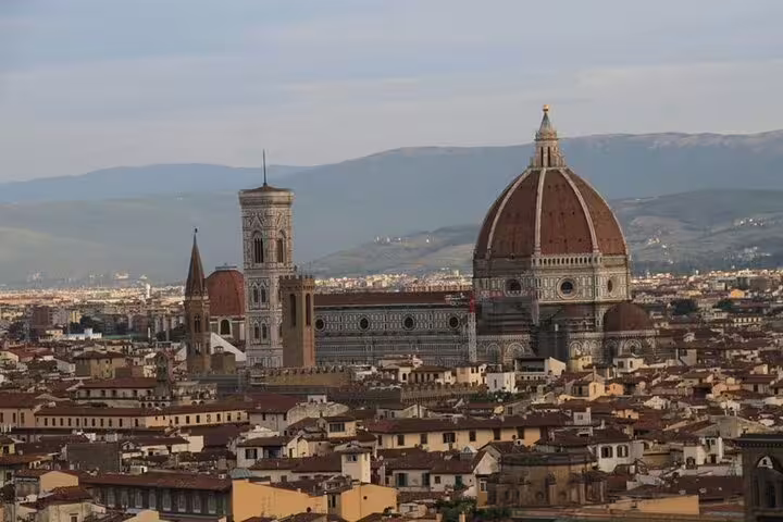 Panoramic view of Florence showcasing the iconic Duomo, perfect for exploring top historical sites on a 4-hour guided tour.