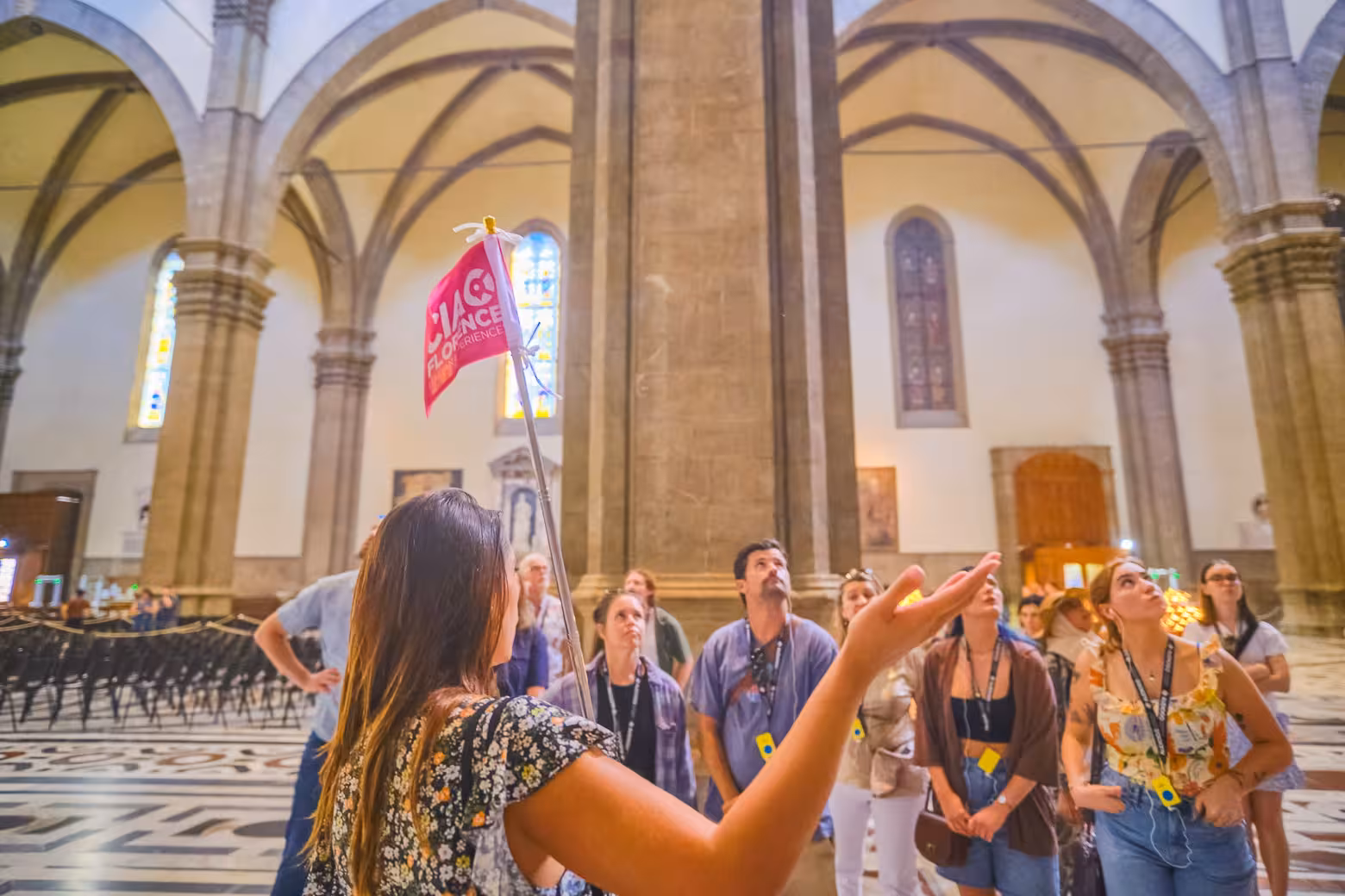 Tour group inside Florence Duomo exploring its intricate architecture and historical significance.