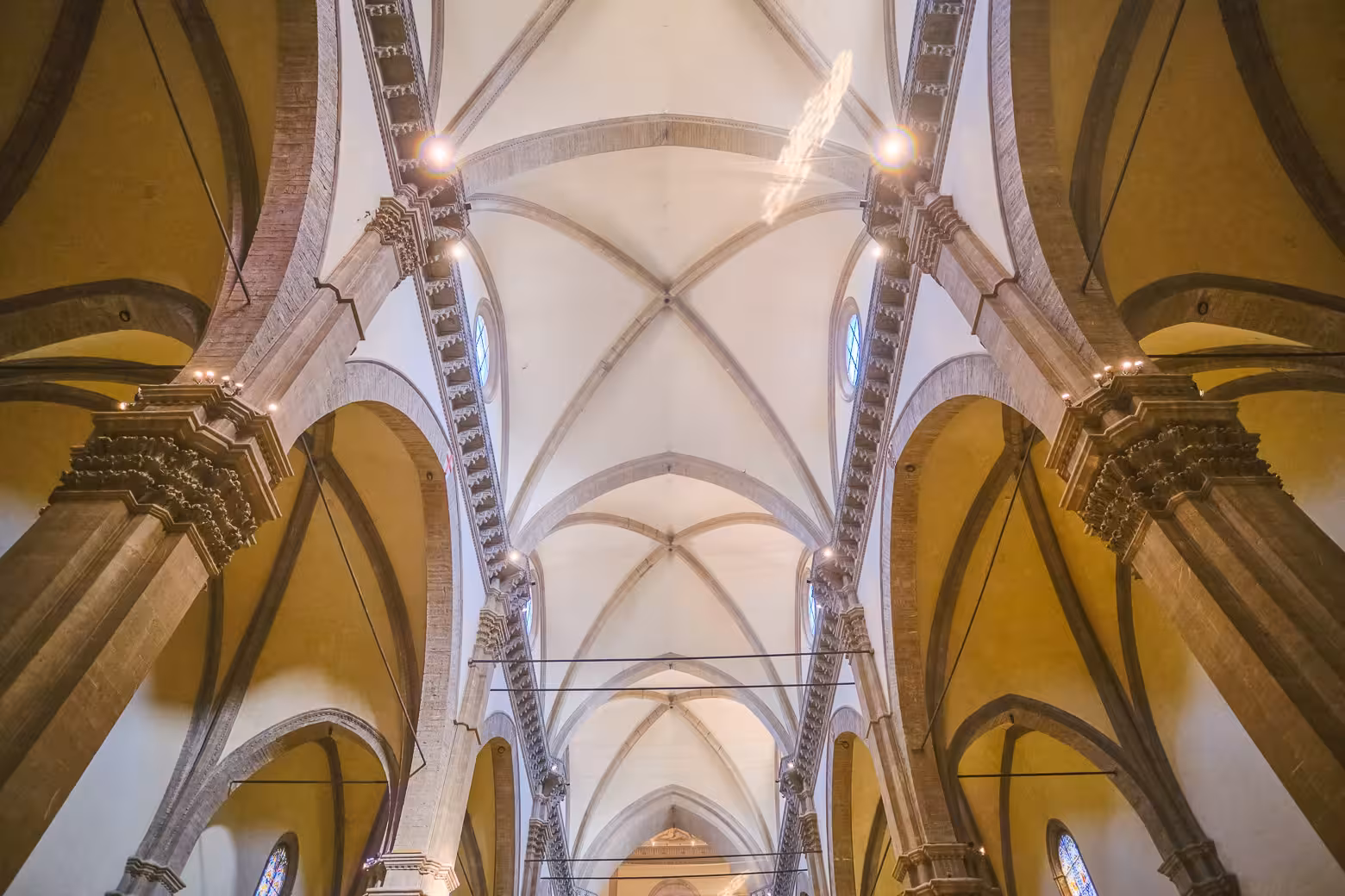 Majestic vaulted ceilings of Florence's Duomo showcase Gothic architecture on a guided tour.