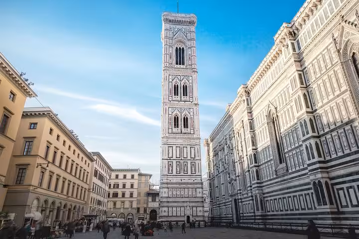 View of Florence's Giotto's Campanile with intricate architecture, a highlight on the Rome to Florence day tour.