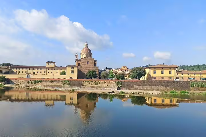 Scenic view of Florence riverside and dome church reflected in the Arno River on La Spezia and Carrara day tour