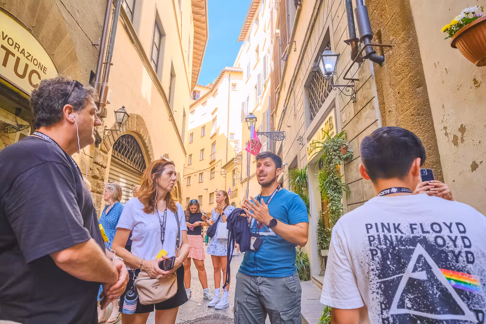 Tourists explore Florence's charming streets during a full-day shore excursion from Livorno with local guide.