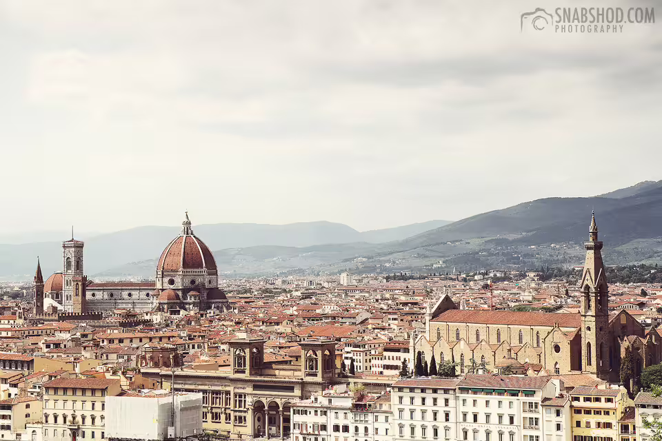 Panoramic view of Florence skyline with Duomo and historic churches on Florence day trip from Rome semi-private tour