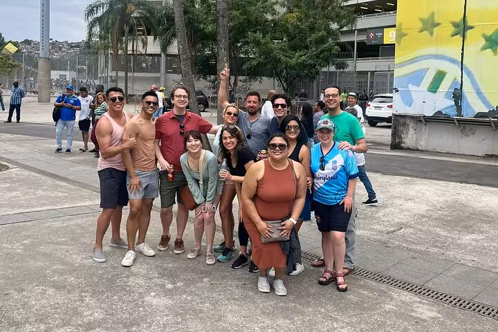 Tour group posing outside Maracanã before a Fluminense soccer match in Rio de Janeiro, matchday experience