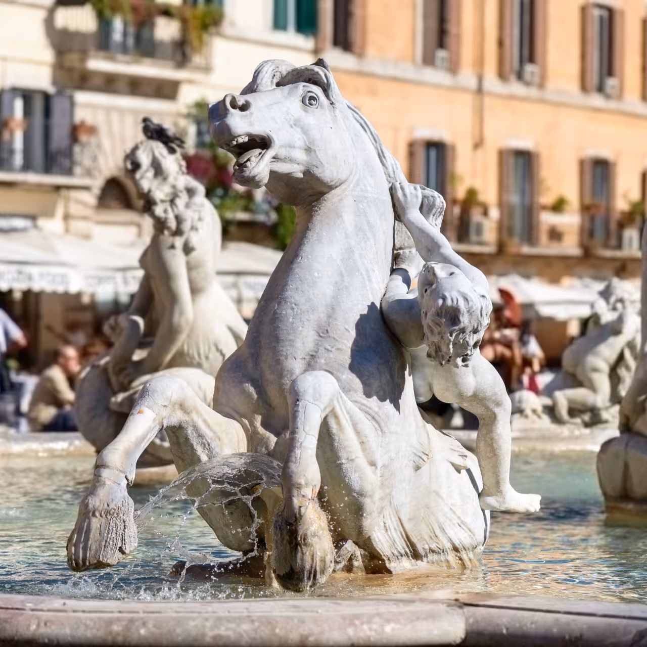 Fontana del Moro sea-horse sculpture in Piazza Navona on Baroque Rome guided tour of fountains and art