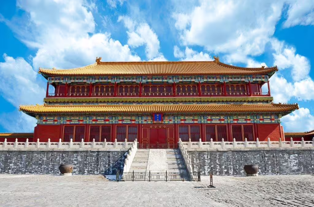 Majestic view of the Forbidden City with vibrant red and gold architecture, a highlight of any Beijing cultural tour.