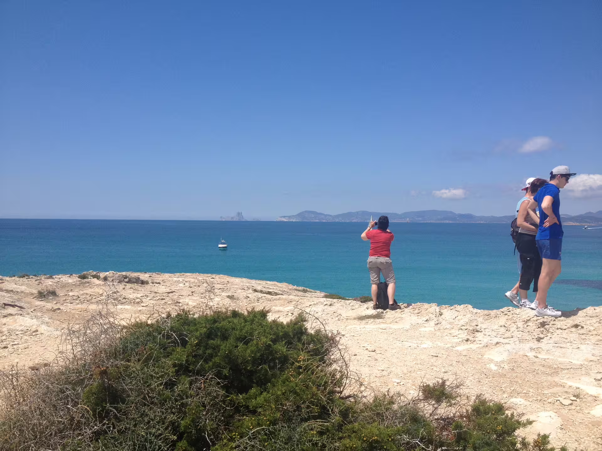 Scenic Formentera coastal viewpoint on Ibiza day trip with transfers and fast ferry, overlooking turquoise Balearic Sea