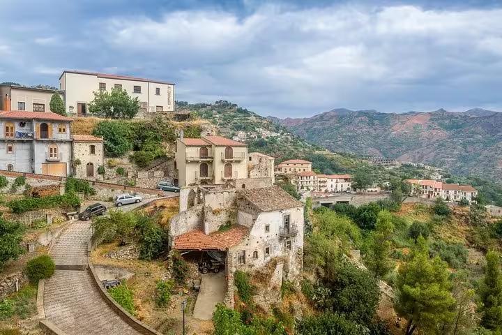 Picturesque hillside view of Forza d'Agrò, Sicily, highlighting scenic landscapes on the Godfather trail from Messina port.
