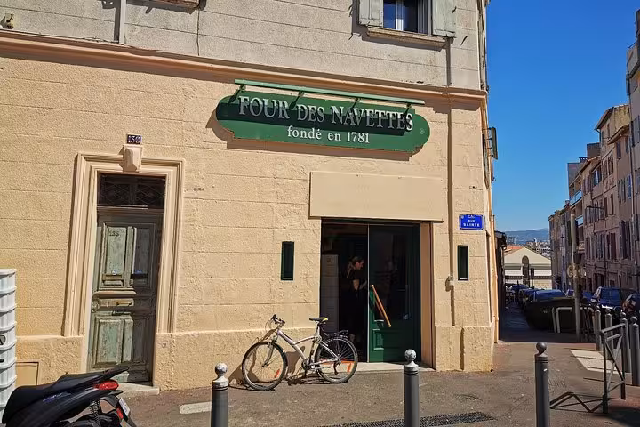 Four des Navettes historic bakery facade in Marseille, a charming stop on a city sightseeing shore excursion