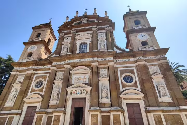 Historic church facade in Frascati, Italy, showcasing intricate architecture, a highlight of the private day trip with wine tasting.