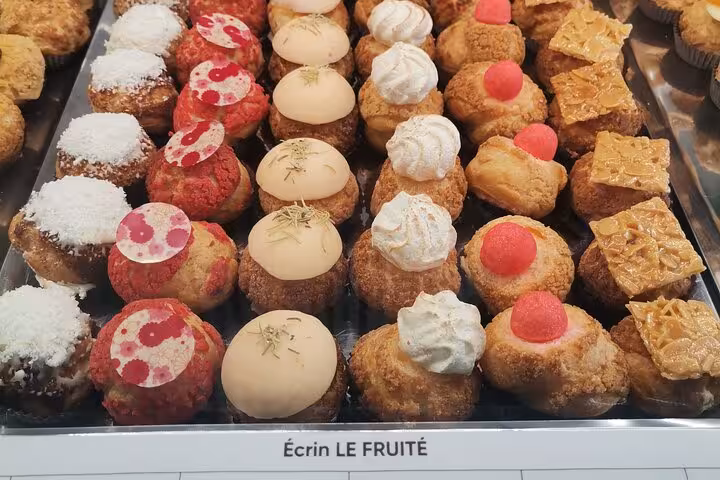 French pastry display at Noailles market, Marseille, tasting local sweets on Cours Julien food tour