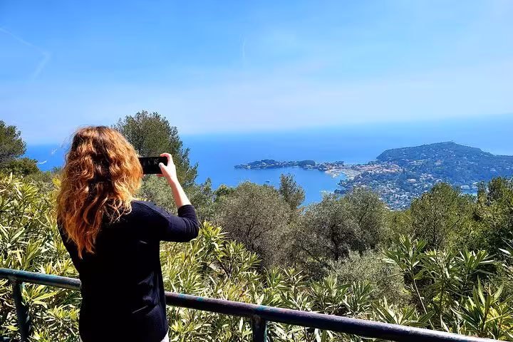 Traveler captures stunning French Riviera coastline view during private excursion cruise stopover.