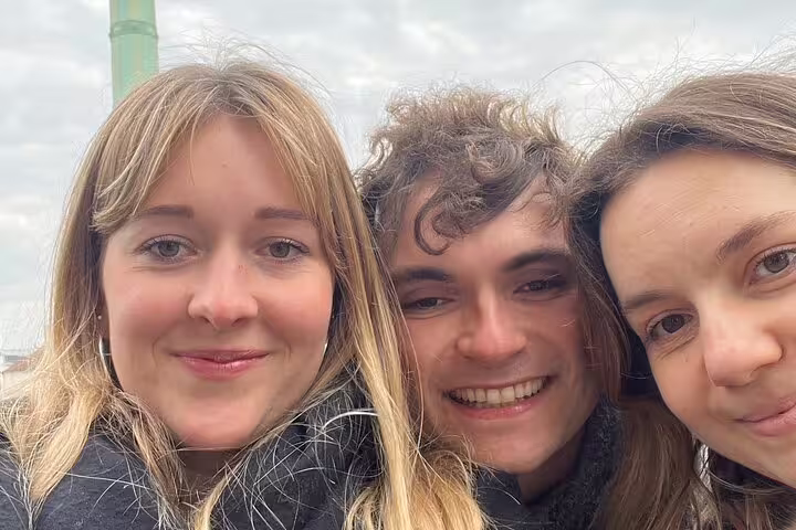 Friends selfie on a Paris Marais District scavenger hunt, enjoying a self-guided walking tour in central Paris