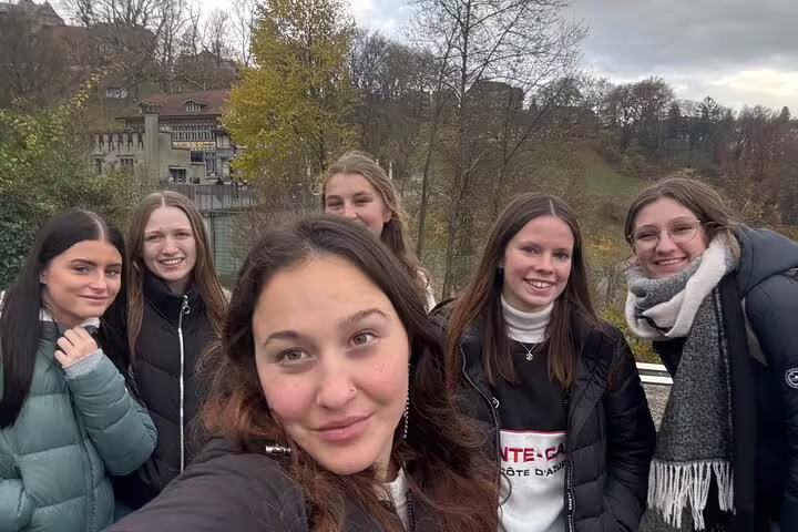 Friends selfie on a Bern scavenger hunt, enjoying Old Town sights on a self-guided walking tour in Switzerland