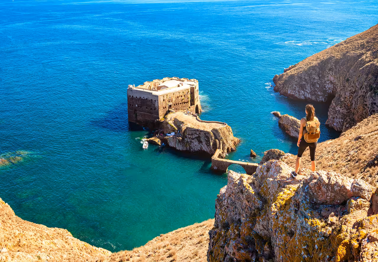 Hiker overlooking Fort of São João Baptista on Berlenga Grande, Portugal, Full Day Pack hiking and boat tour
