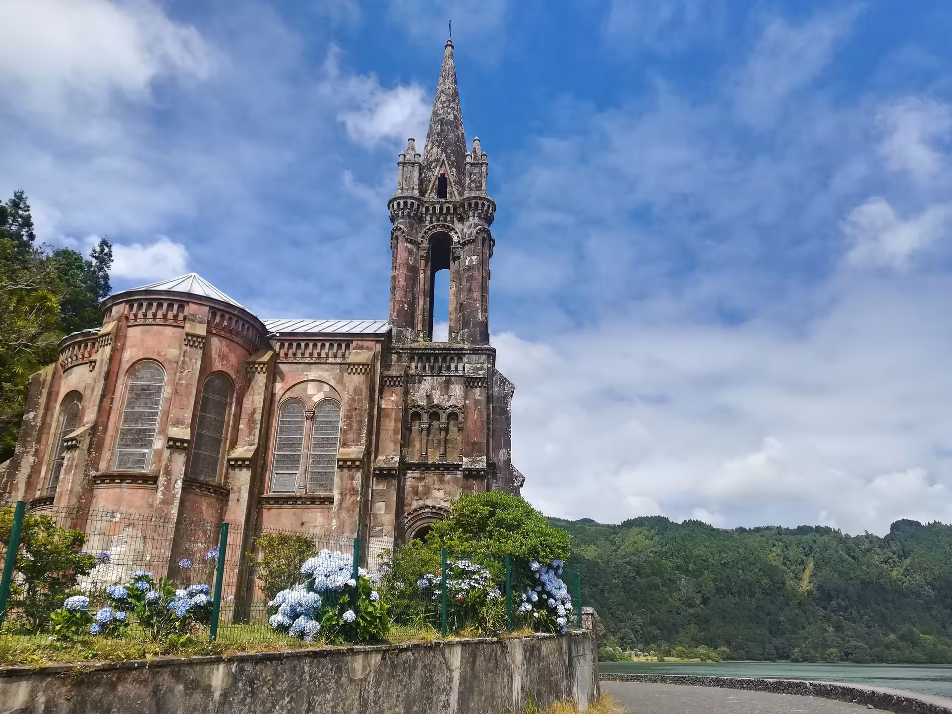Gothic church and hydrangeas by Furnas Lake on São Miguel van tour, full day with lunch included