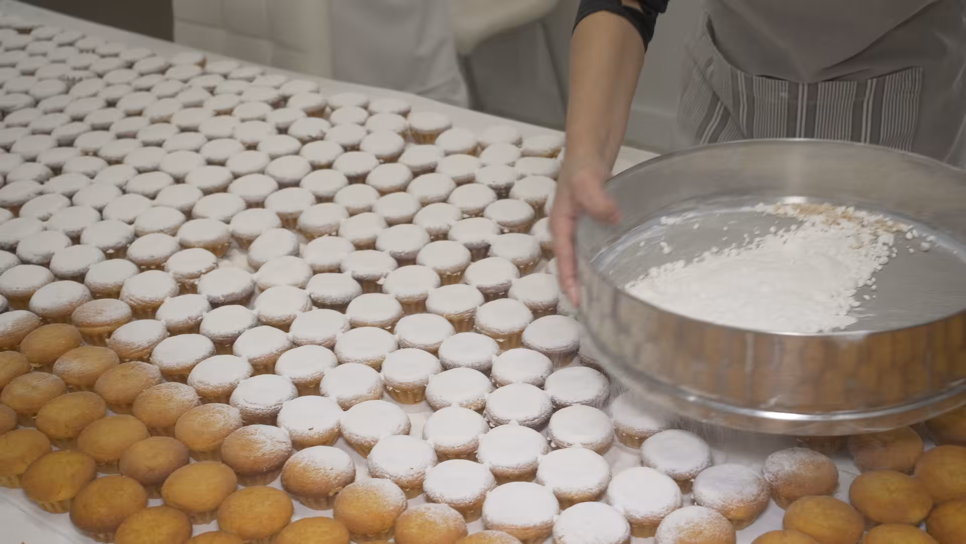 Traditional Furnas pastries dusted with sugar, a tasty stop on the Van Tour Furnas full-day with lunch