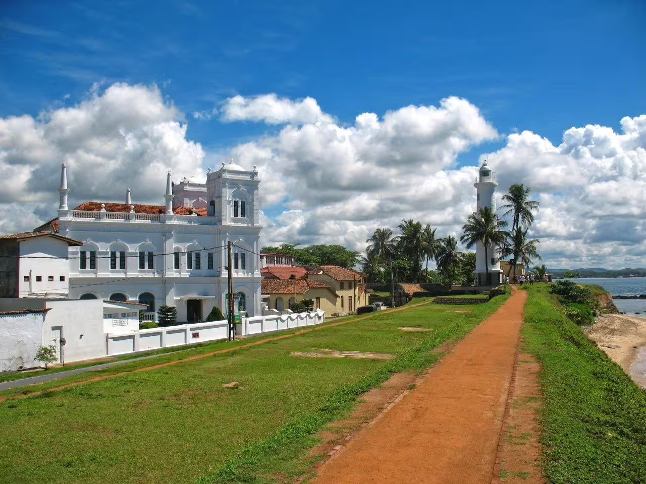 Stroll along the scenic Galle Fort with its charming colonial architecture and iconic lighthouse, Sri Lanka.