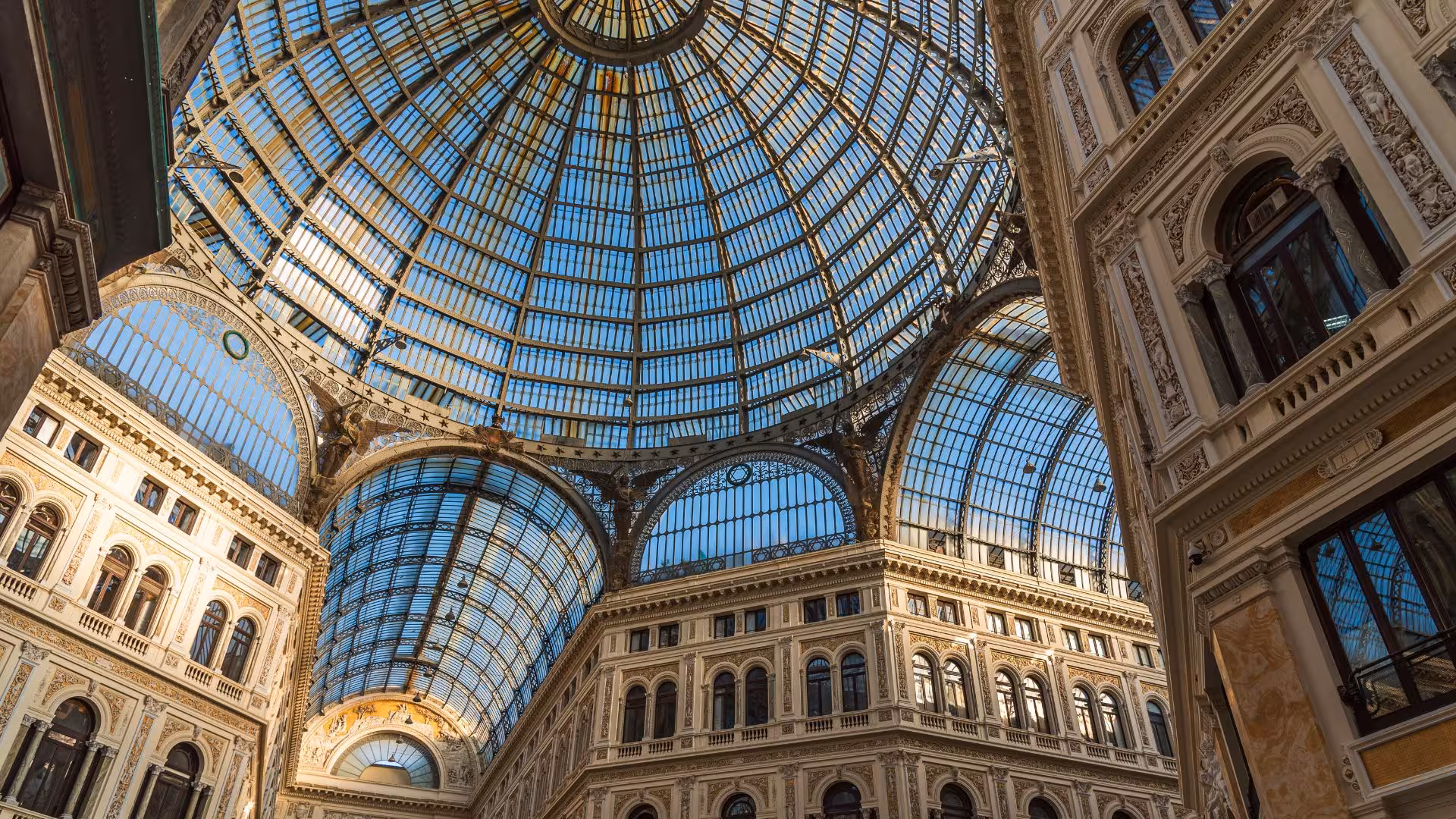 Stunning glass dome of Galleria Umberto I in Naples, offering a breathtaking architectural marvel on the guided tour.