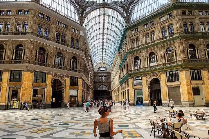 Explore Naples' historic Galleria Umberto I on a private tour from Sorrento, featuring stunning architecture and lively ambiance.