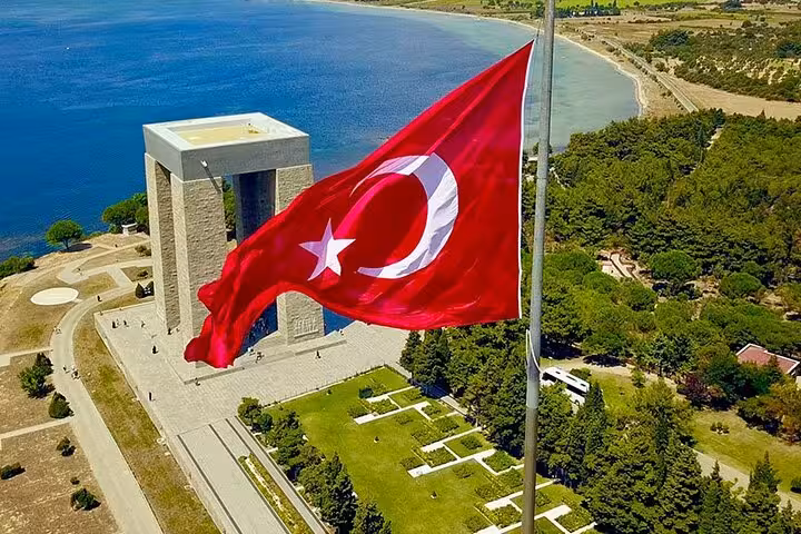 Turkish flag flying over Çanakkale Martyrs Memorial at Gallipoli Peninsula, full-day Istanbul tour with lunch