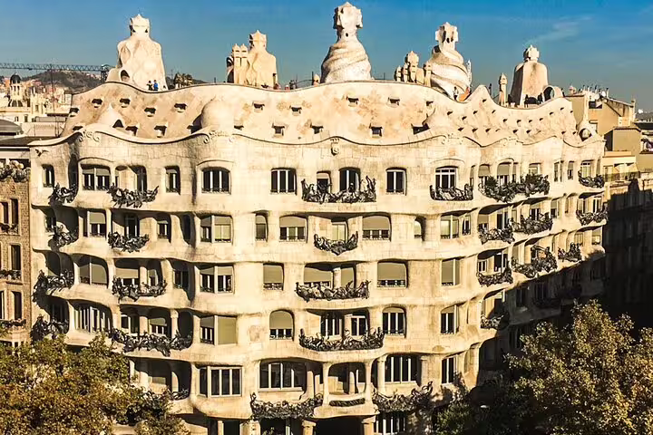 Stunning view of Gaudi's Casa Milà in Barcelona, showcasing its unique architecture, featured in our 2-Day Gaudi & Montserrat Tour.