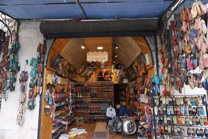 Traditional yemeni shoe shop in Gaziantep bazaar, artisan slippers on private guided city tour