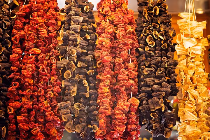 Colorful strings of dried peppers and eggplant in Gaziantep spice market on all-inclusive guided tour