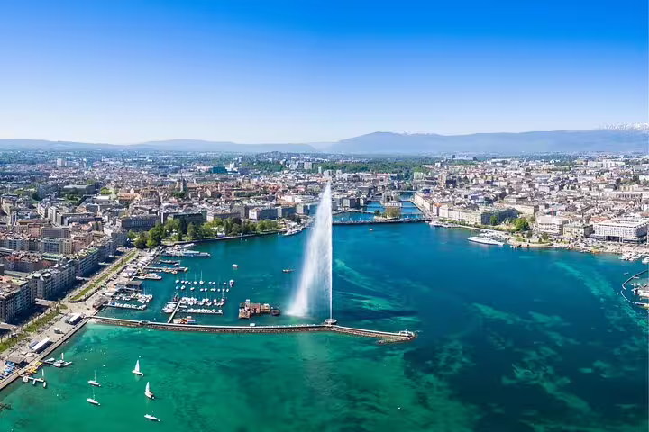 Aerial view of Geneva Jet d’Eau on Lake Geneva, a key stop on the self-guided scavenger hunt highlights tour