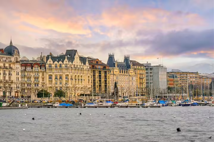 Geneva lakeside skyline on Lake Geneva at sunset, ideal stop on a self-guided scavenger hunt highlights tour