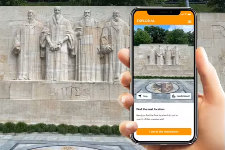 Smartphone app guiding Geneva scavenger hunt at the Reformation Wall, interactive city highlights walking tour
