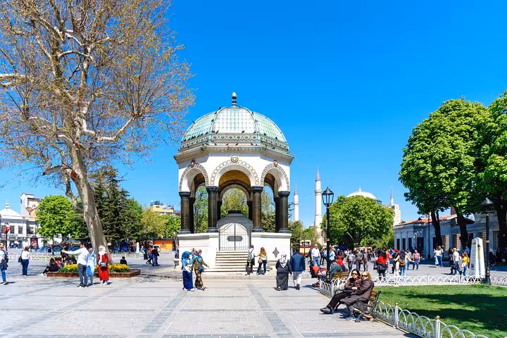 German Fountain in Sultanahmet Square on Istanbul Old City tour by private guide and car, lively scene