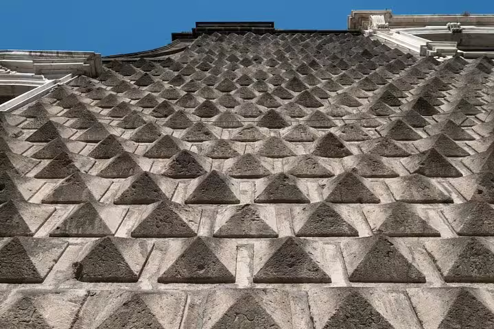 Close-up of the mysterious diamond-point façade of Gesù Nuovo church, a key stop on Naples superstitions and secrets tour
