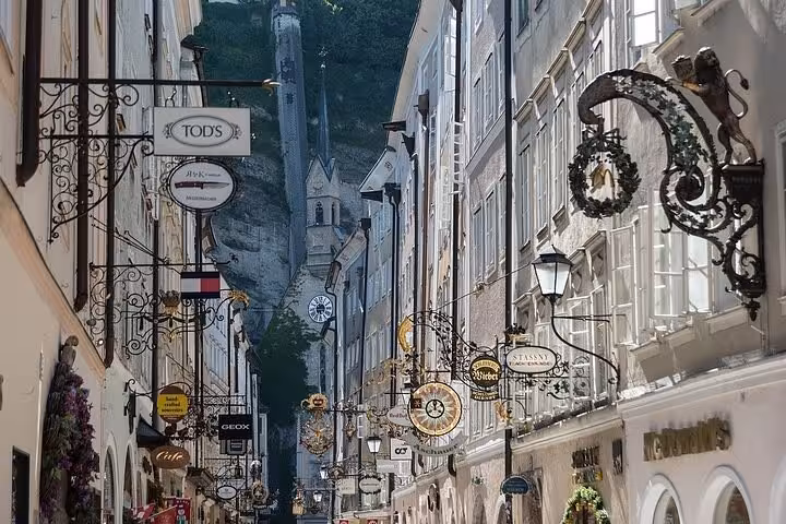 Getreidegasse shopping street in Salzburg Old Town, iconic sights on a Salzburg private day tour from Munich