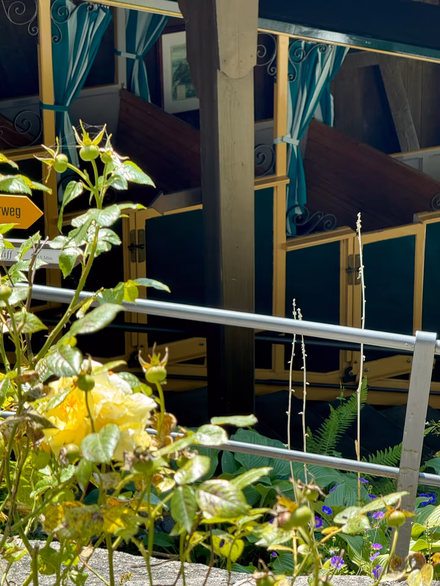 Giessbach funicular station with flowers, a charming highlight on the Iseltwald to Giessbach e-bike tour