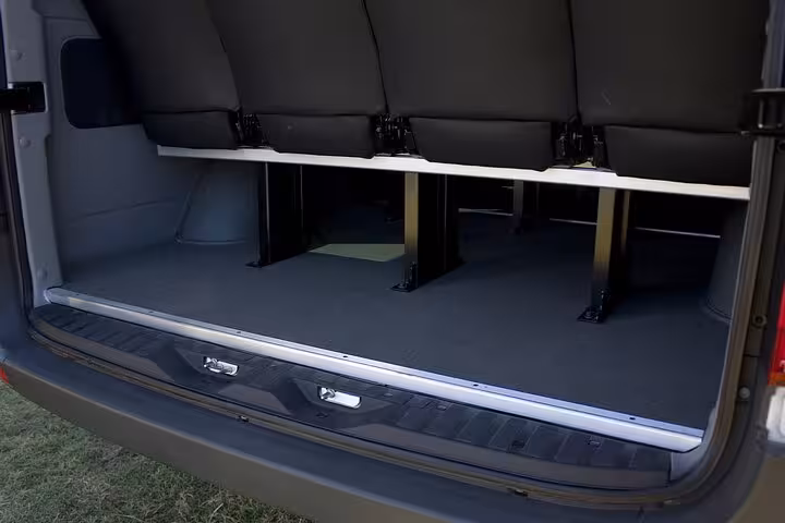 Spacious luggage compartment of a private transfer van from GIG Airport to Barra da Tijuca hotels.