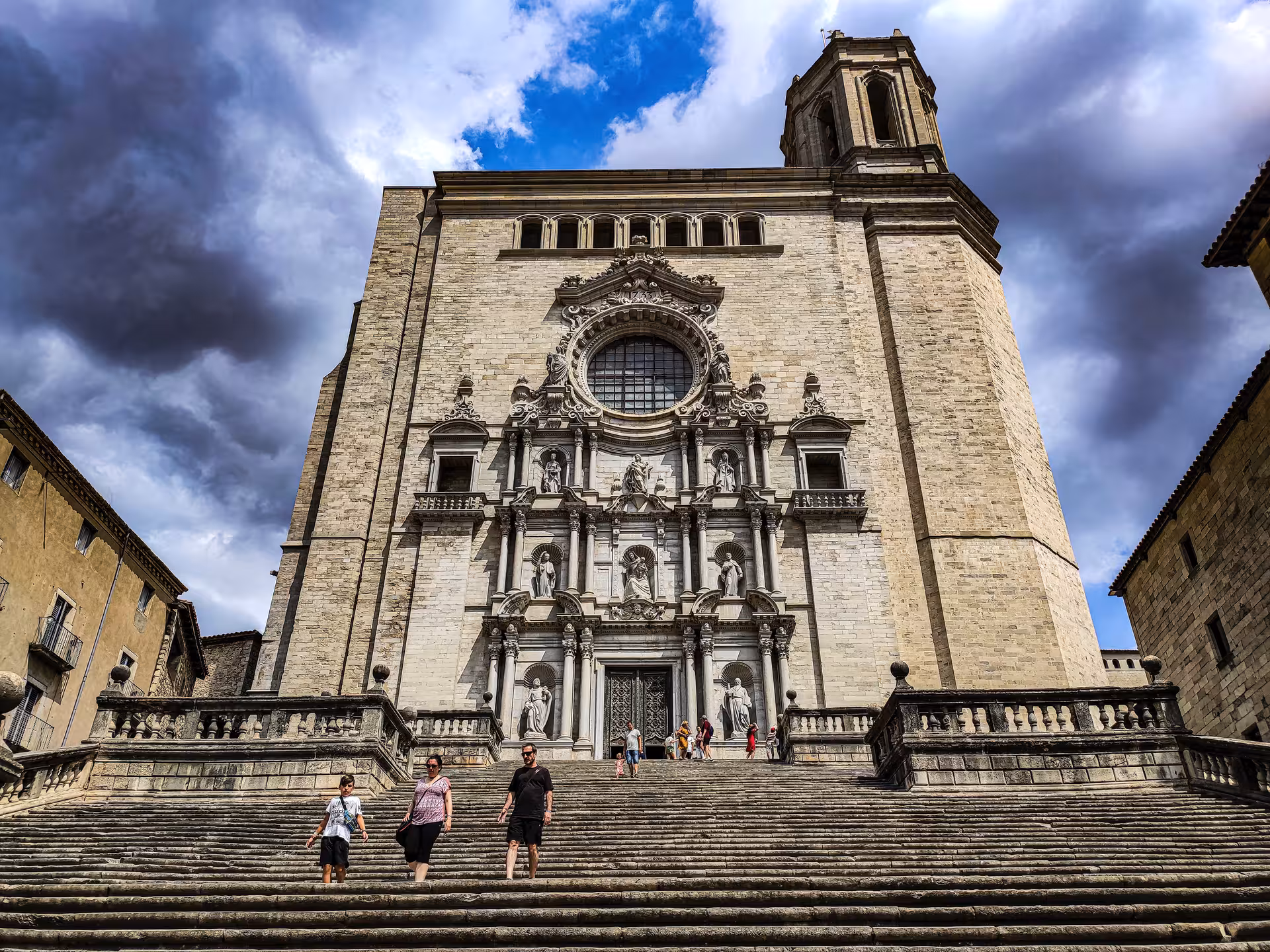 Girona Cathedral facade and grand steps with visitors, highlight of Girona and Costa Brava full-day tour