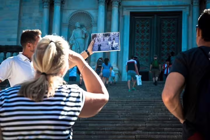Tourists admire the iconic steps of Girona Cathedral, a highlight of the Girona City and Costa Brava Tour.